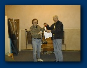 Dave Burden presents the Eric Mollart Trophy to Andrew Mead