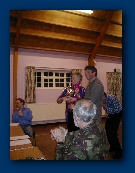 Lynda Gage presents the Eric Mollart Memorial Trophy to Andy Collett.